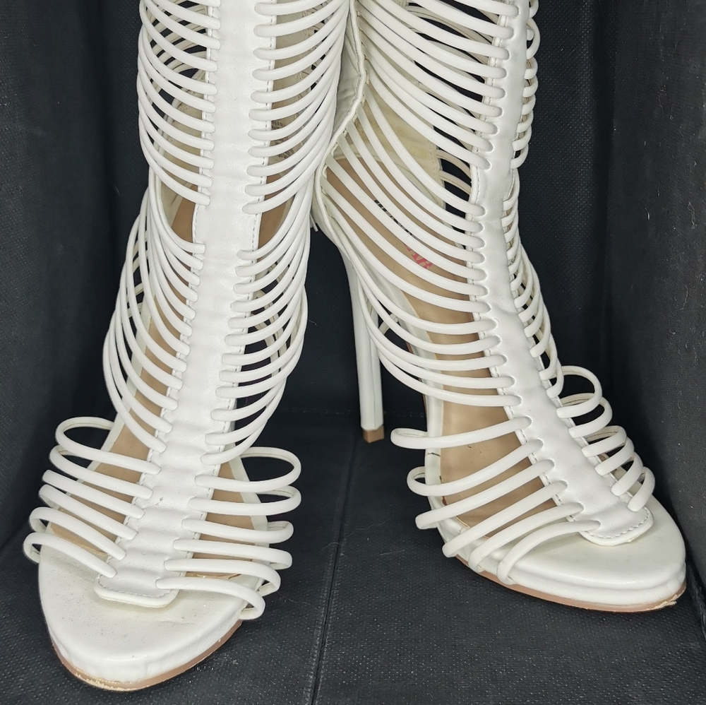 Strappy heeled boot